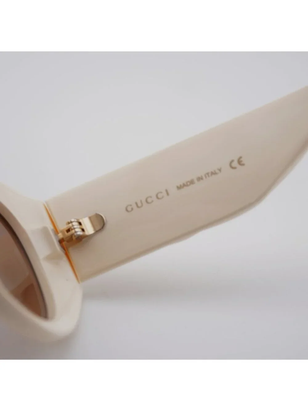 Gucci GG0809S 002 Sunglasses Ivory Cat Eye Frame, Brown Lenses